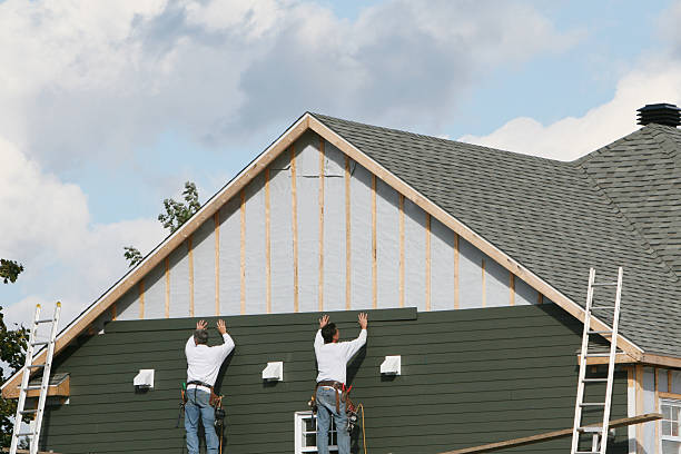 Professional Siding Contractor technician working in Winterville, GA